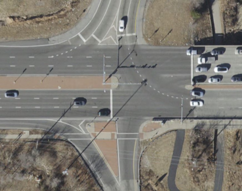 Solid Wide Lane Lines Around Island at Ramps.JPG