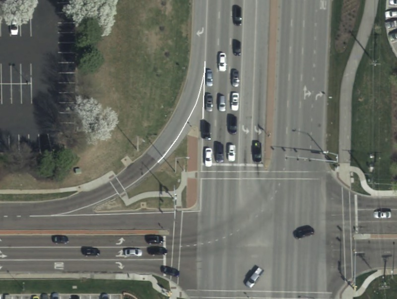 Solid Wide Lane Lines Around Islands at Intersections.JPG