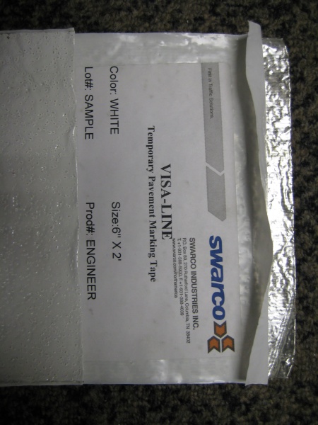 File:TRF PQL TC PHOT Swarco Non-RemovableTape White.JPG